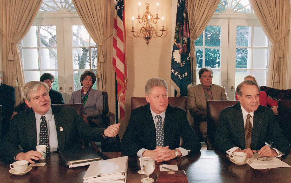 historical photo of Newt Gingrich and Bill Clinton in the Oval Office