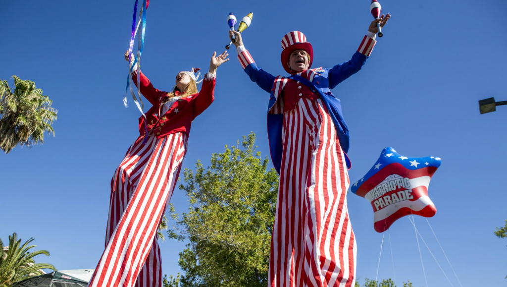 patriotic stilt walkers