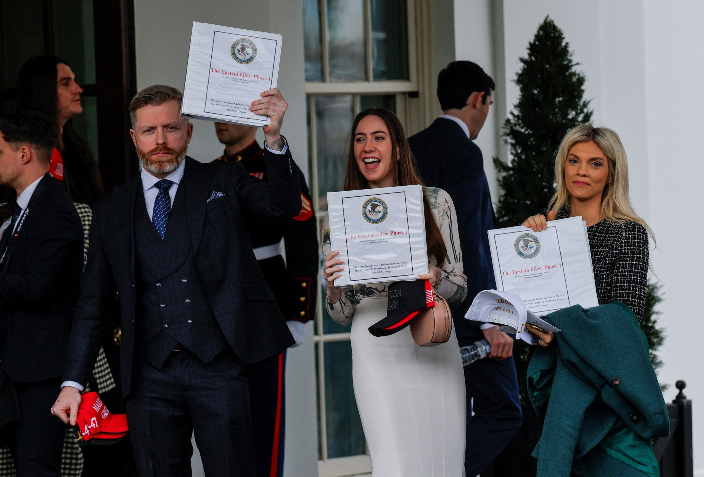 maga influencers holding epstein binders