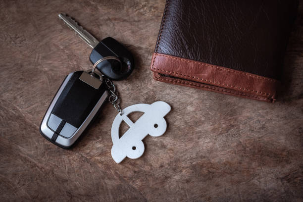 credit kars and car keys on table