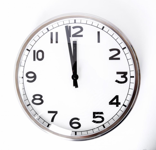 full-view-of-clock-nearing-noon-or-midnight.jpg